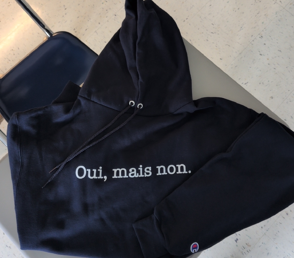 Champion Long-sleeved Navy Blue Hoodie with French Text